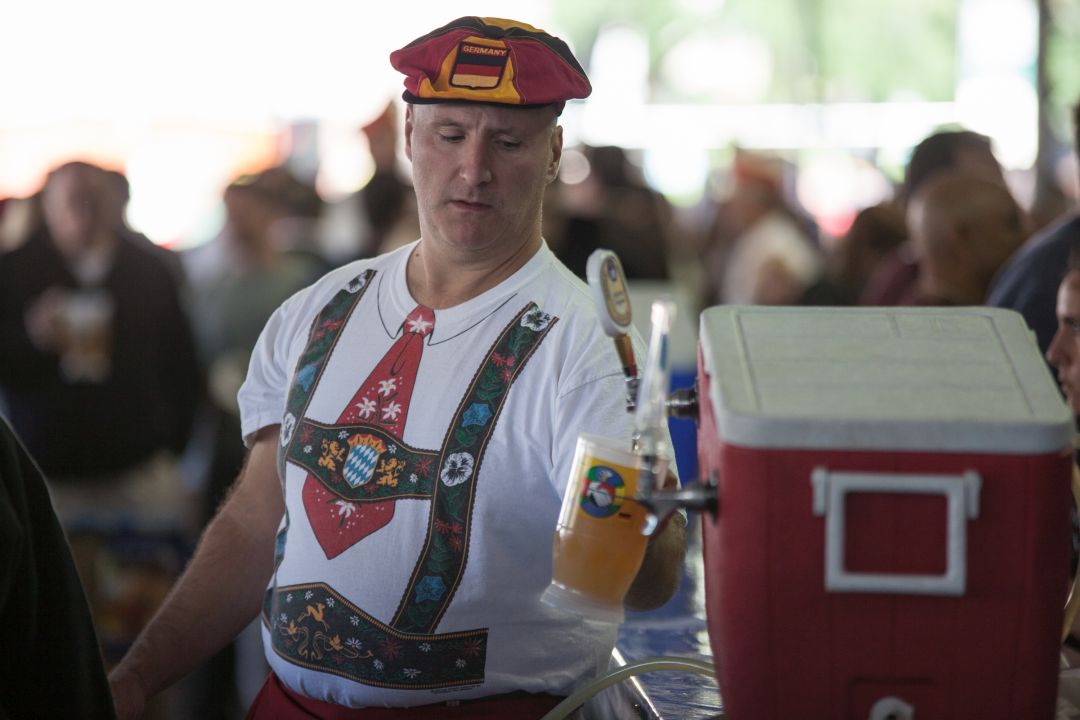 Man Pouring Beer at Oktoberfest