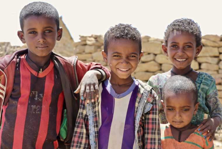 four young kids in Africa