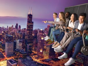 view of the chicago skyline with a type of rollercoaster high above it.